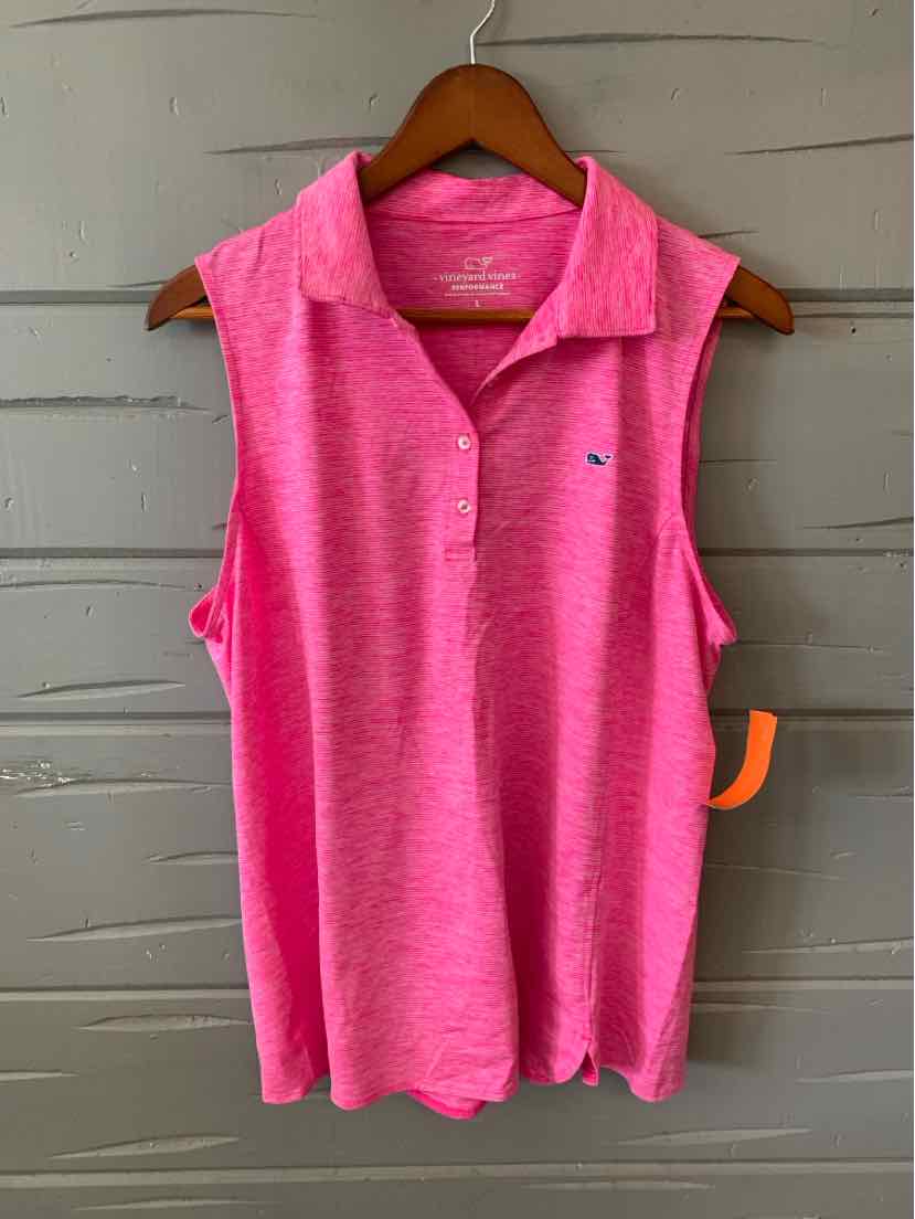 Sleeveless pink polo shirt with collar and small whale logo on chest, soft textured fabric.