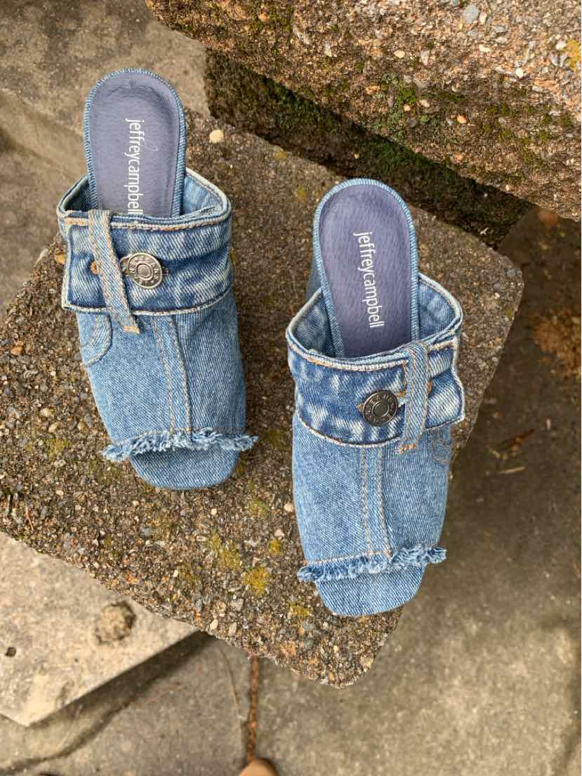 Denim slide sandals with adjustable buckle strap and frayed edges, size 6.