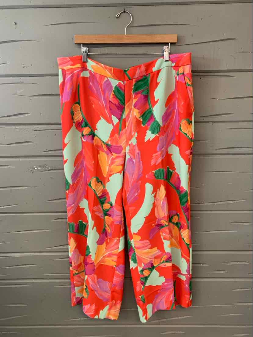 Women's colorful floral loose-fit pants with shades of red, pink, green, and orange, size 18.