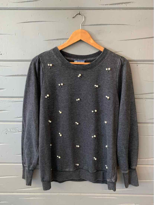 Dark gray long-sleeve sweatshirt with small white pearl embellishments scattered on the front.