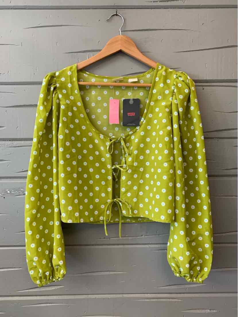 Green long-sleeve blouse with white polka dots, square neckline, and front tie detail.