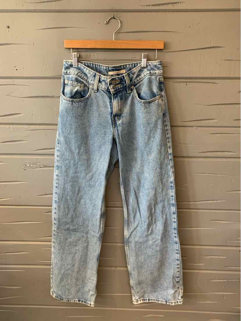 Light blue high-waisted Levi's denim jeans with a straight leg and classic five-pocket design.