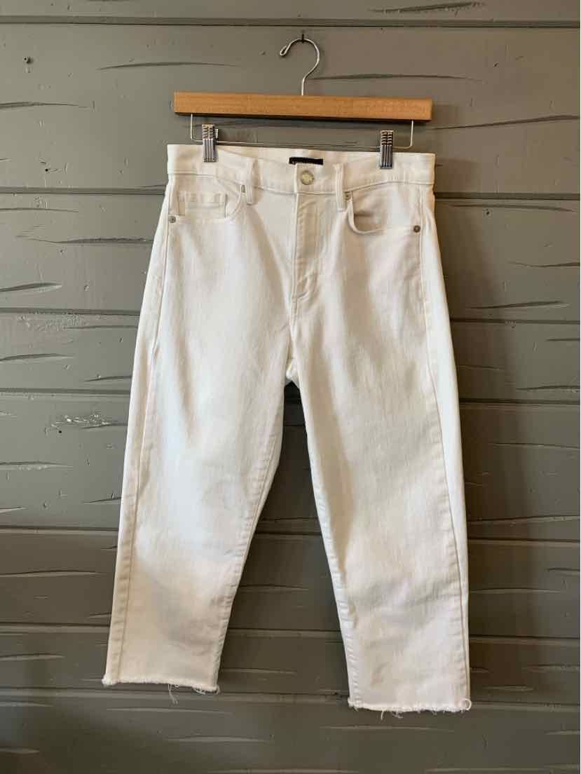 White denim jeans with a straight-leg cut, frayed hems, and classic five-pocket styling.