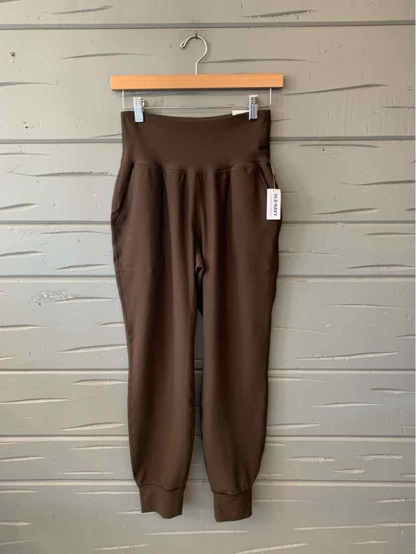 Brown Old Navy women’s jogger pants with an elastic waistband, side pockets, and tapered cuffs.