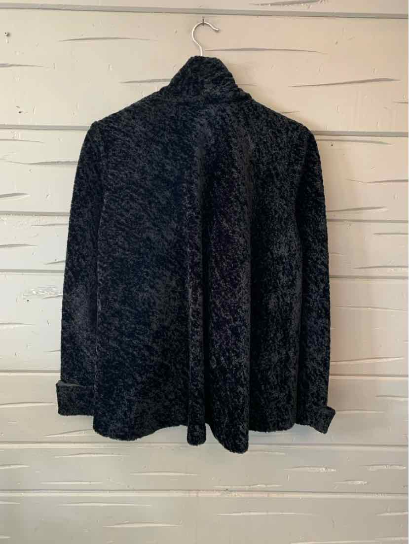 Black textured knit cardigan with a high collar, long sleeves, and an open front.