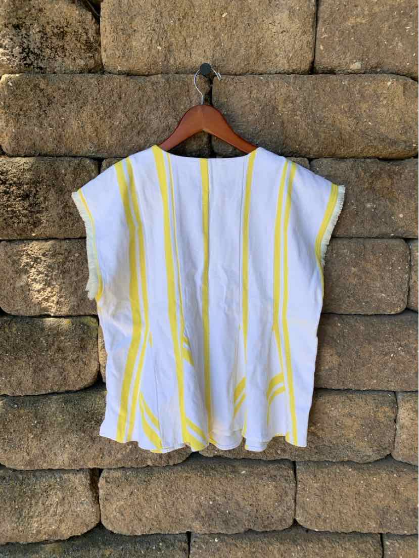 White loose-fit short-sleeve top with vertical yellow stripes and a round neckline.