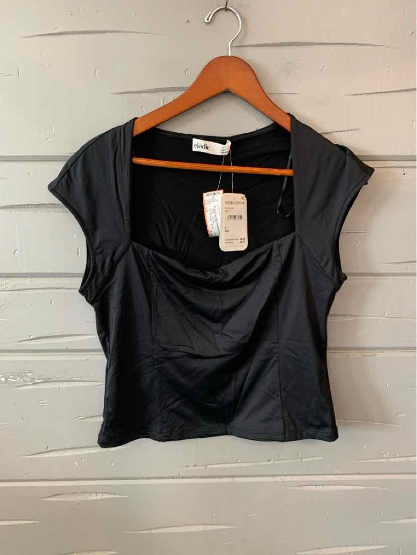 Black short-sleeve blouse with square neckline and ruched front detail on wooden hanger.