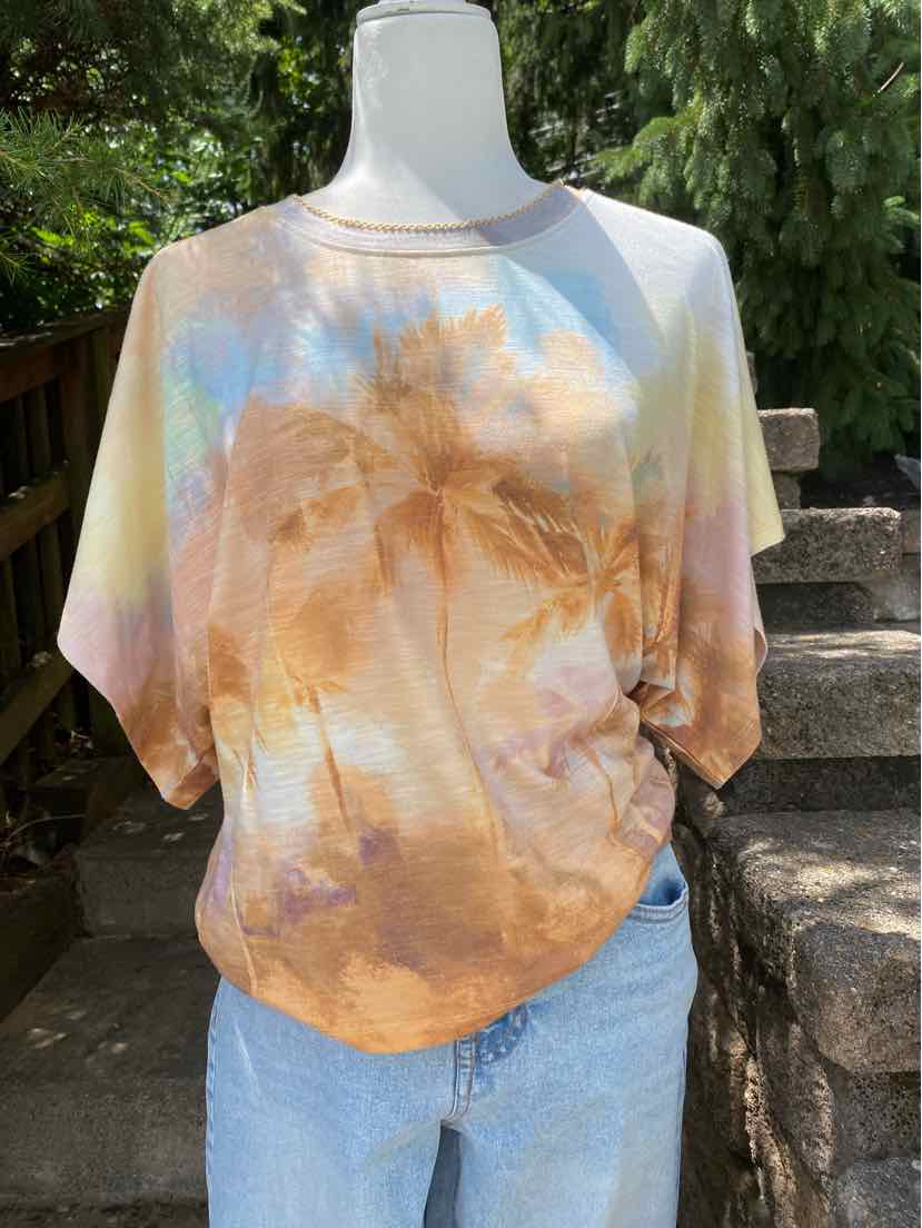 Short-sleeve loose-fit tie-dye top with pastel blue, orange, and beige shades on lightweight fabric.