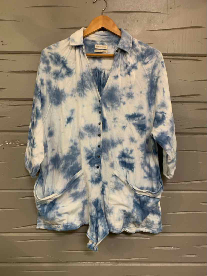 Blue and white tie-dyed long-sleeve button-up shirt with collar and front pockets.