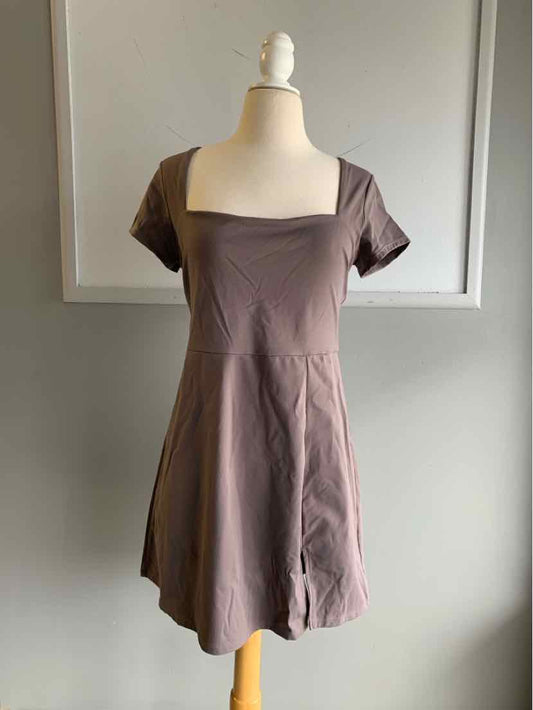 Taupe short-sleeve dress with square neckline and flared skirt on mannequin.