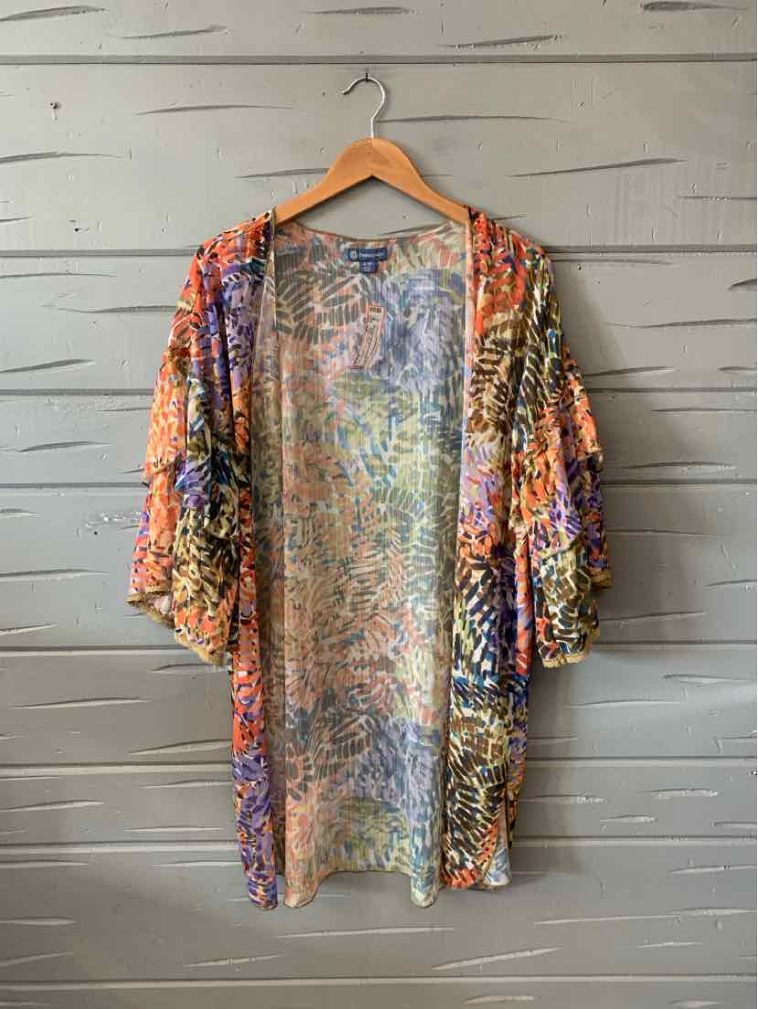 Colorful multi-patterned lightweight open-front kimono with loose, flowy sleeves hanging on wooden hanger.