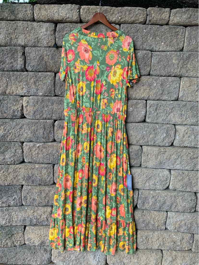 Green floral maxi dress with pink and yellow flowers, short sleeves, and a gathered waist.
