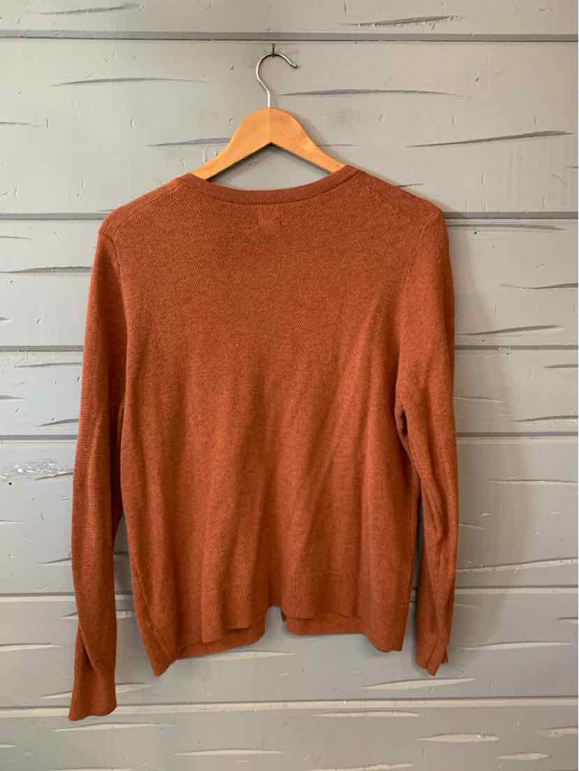 Rust-colored long-sleeve crewneck sweater with a soft knit texture in size large.