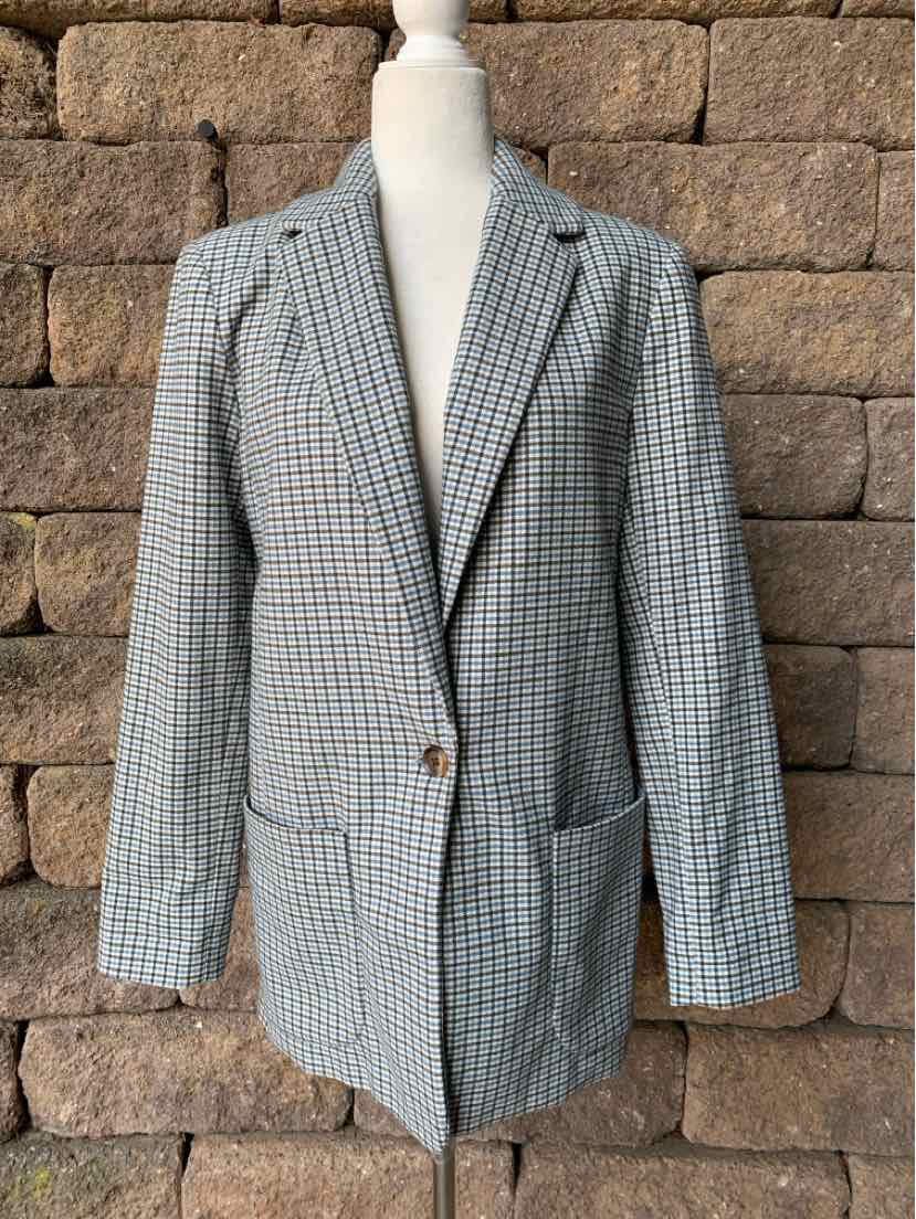 Women's plaid blazer in muted blue, beige, and brown tones with notch lapels and front patch pockets, single-breasted with.