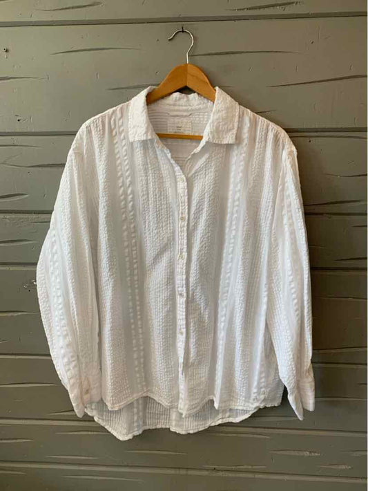 White long-sleeve button-up blouse with textured vertical stripes and collar, medium size.