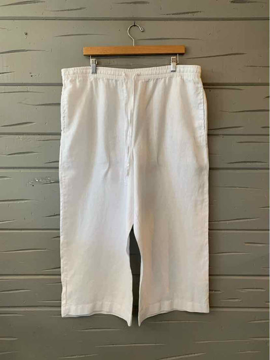 White linen wide-leg pants with elastic waistband and side pockets in size XL.