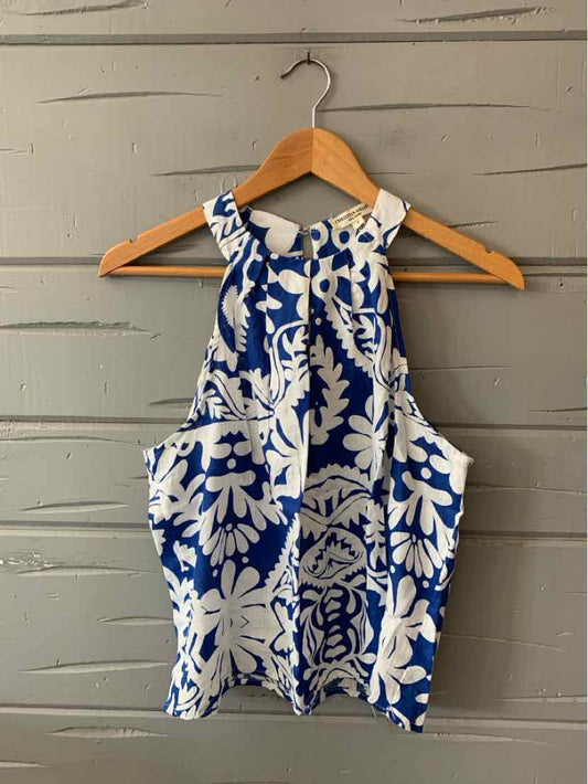 Blue and white floral halter neck crop top with keyhole back in lightweight fabric.