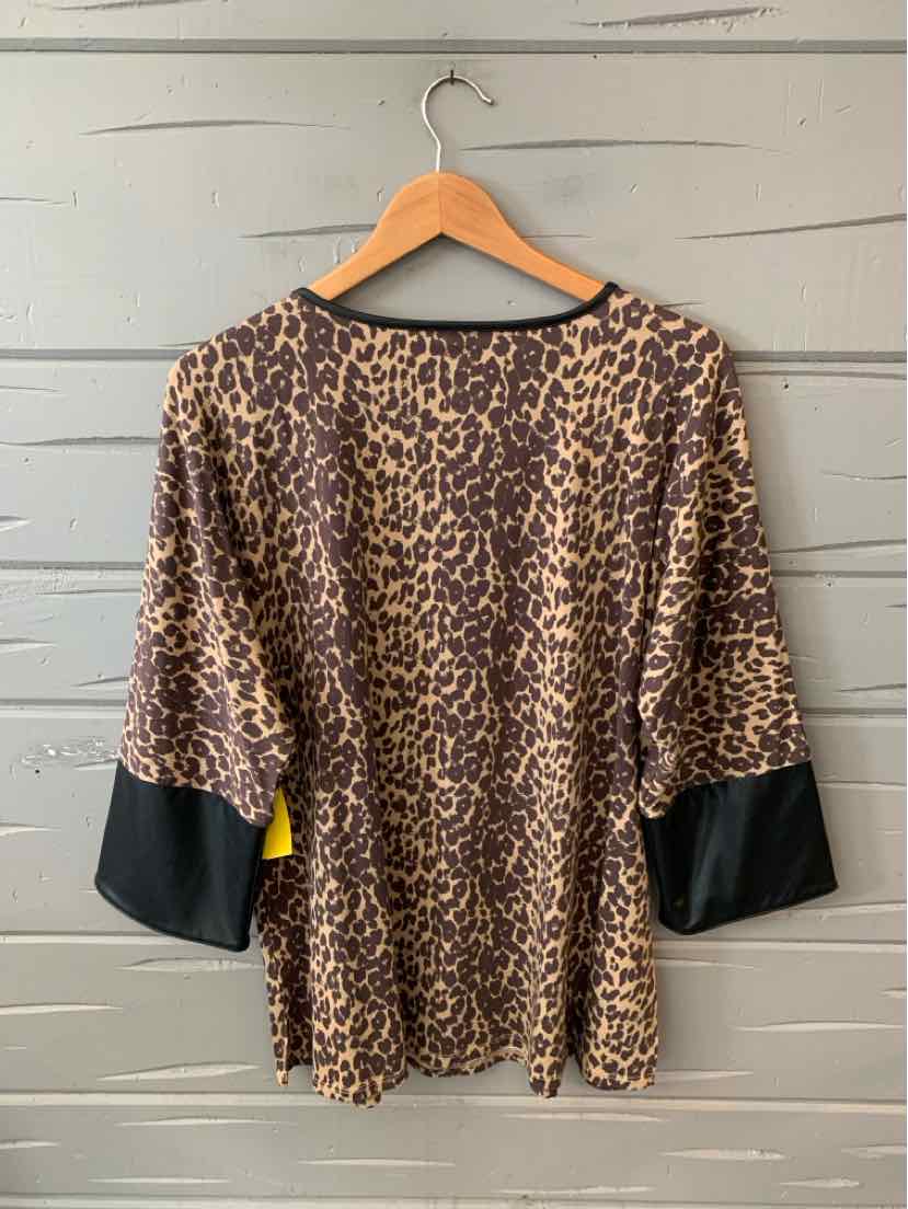 Brown leopard print blouse with black wide cuffs and scoop neckline, size medium.