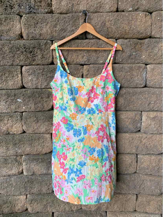 Sleeveless floral multi-color dress with thin straps and scoop neckline, size XL.