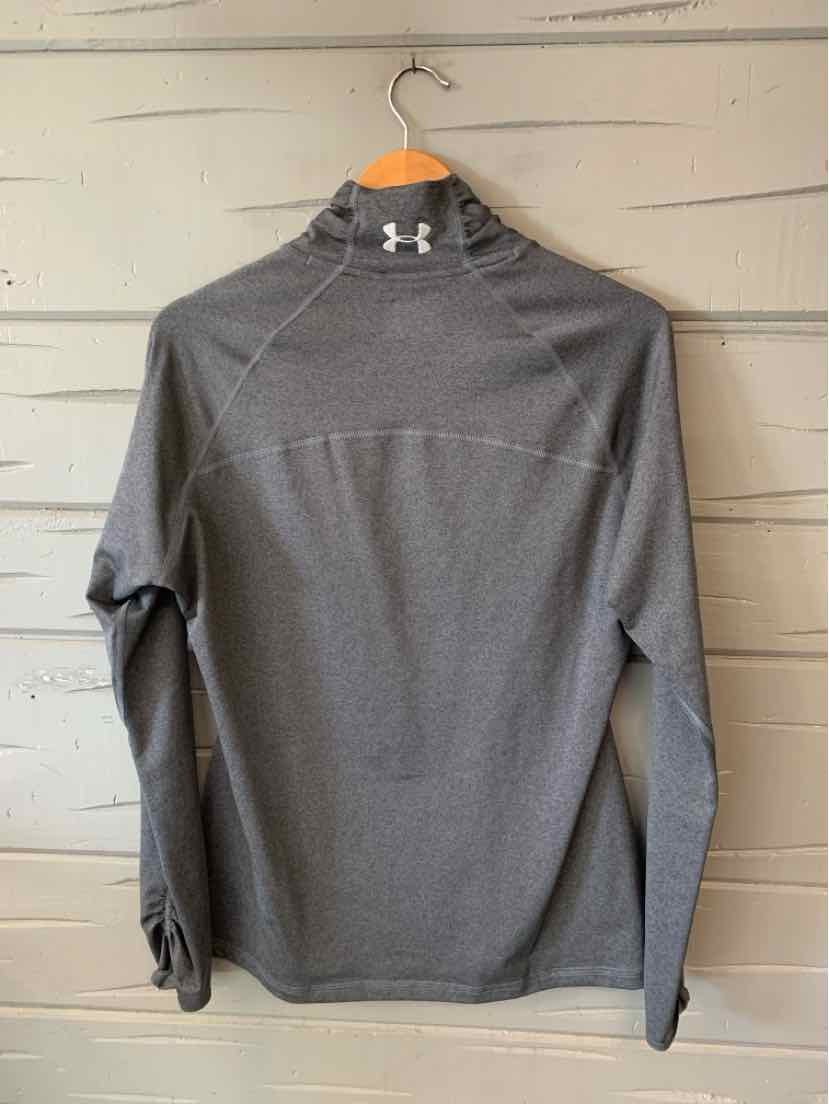 Gray long-sleeve Under Armour pullover with high collar and logo on front center.