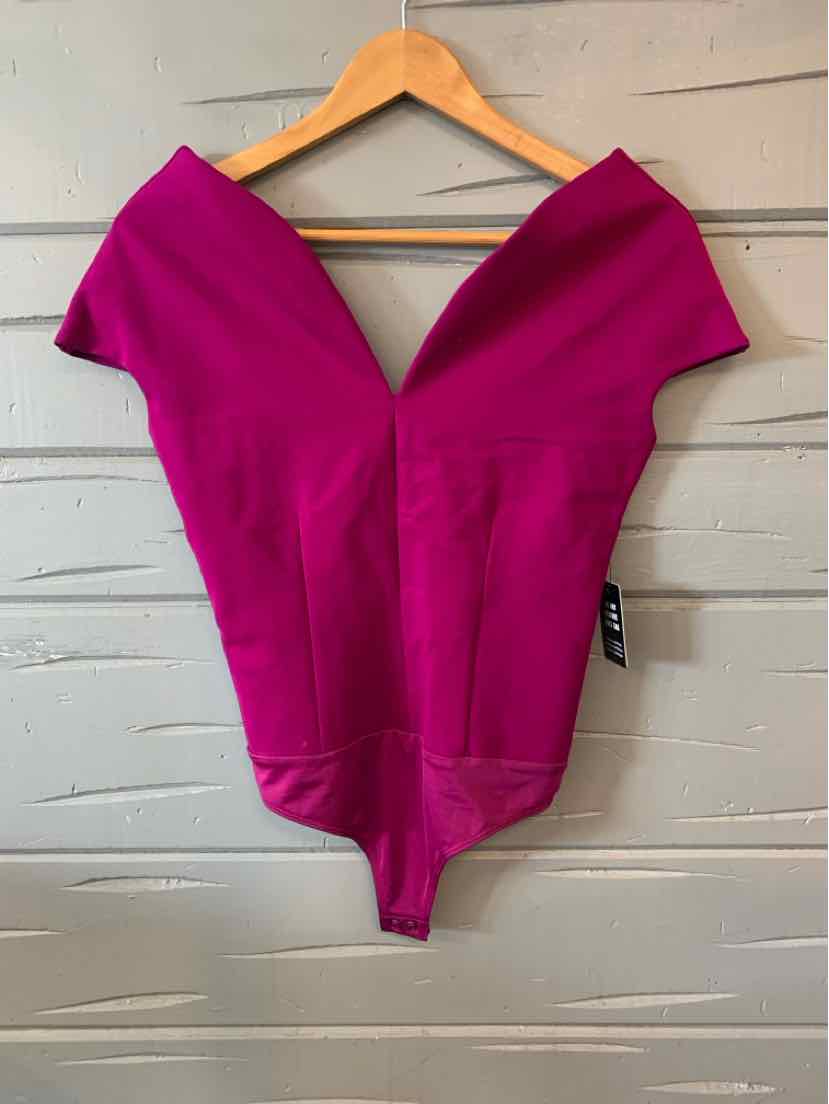 Fuchsia off-shoulder bodysuit with deep V neckline and fitted waist on wooden hanger.