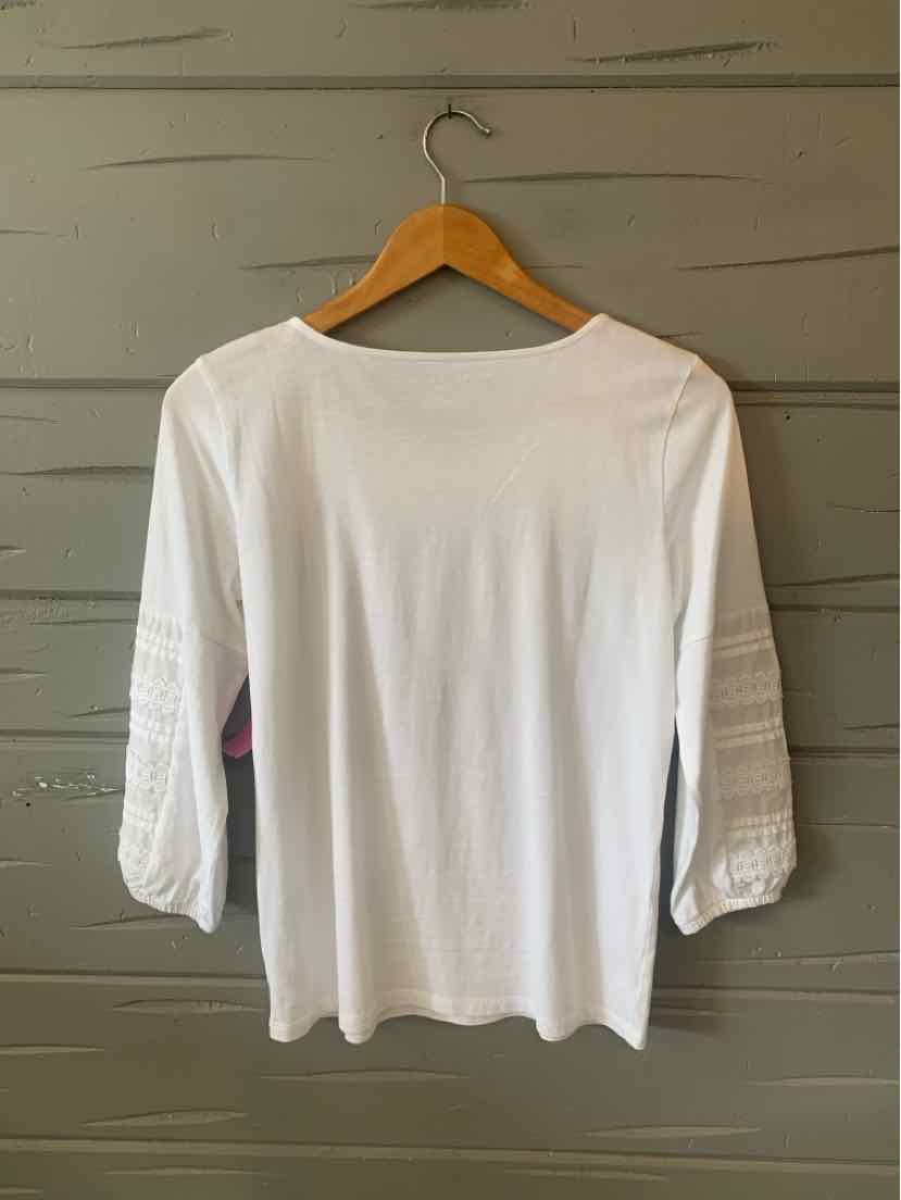White long-sleeve women's blouse with scoop neckline and lace detail on sleeves, size small.