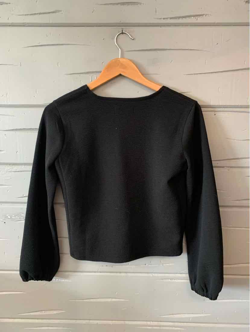 Black long-sleeve fitted top with crew neckline, soft fabric, and slightly gathered cuffs.