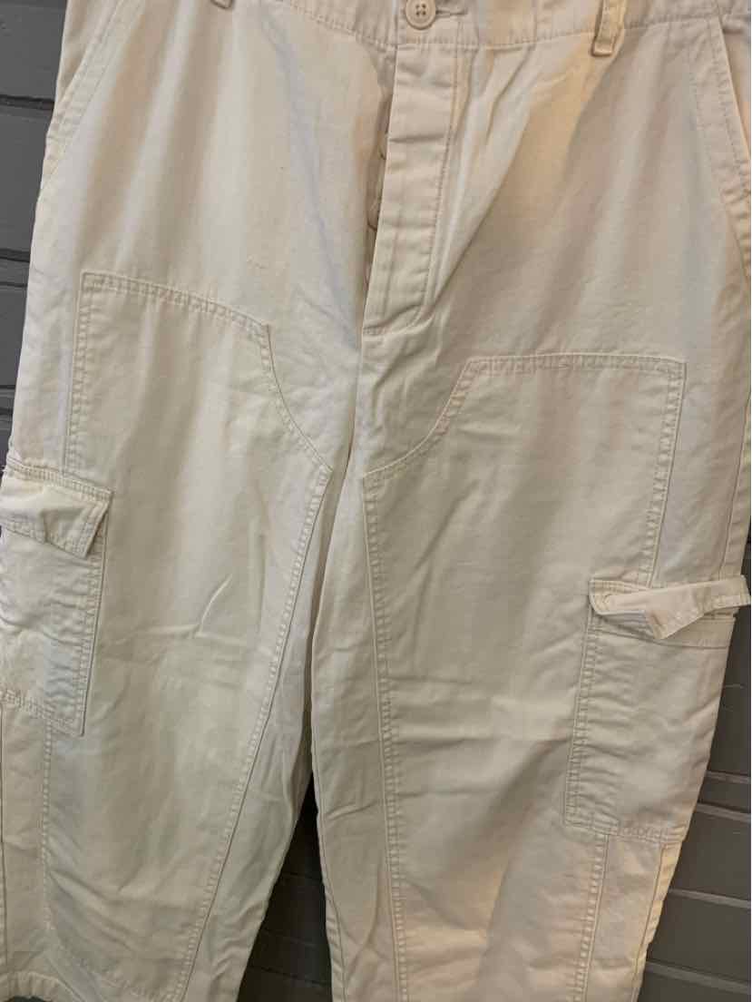 Light beige cargo pants with patch pockets and button closures, size 12.