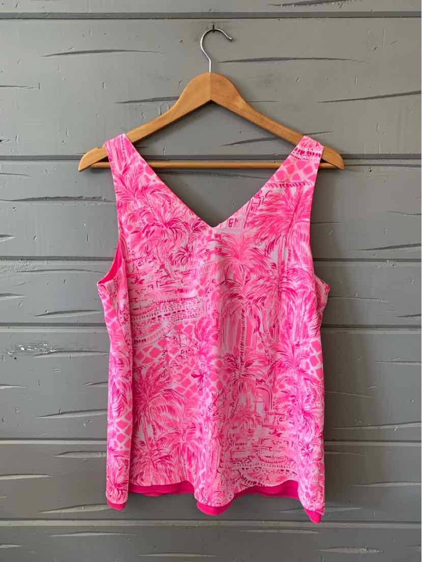Pink sleeveless V-neck tank top with light floral and abstract pattern, relaxed fit.
