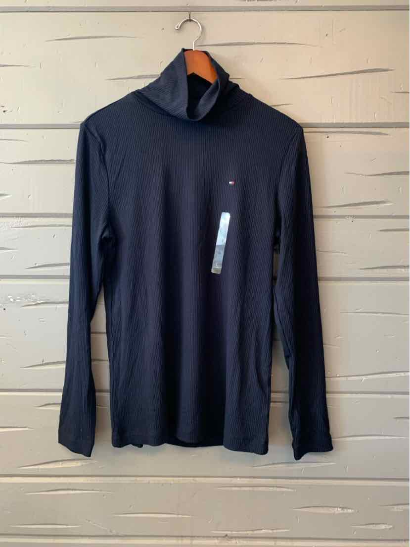 Black long-sleeve turtleneck top with small Tommy Hilfiger flag logo on the chest.