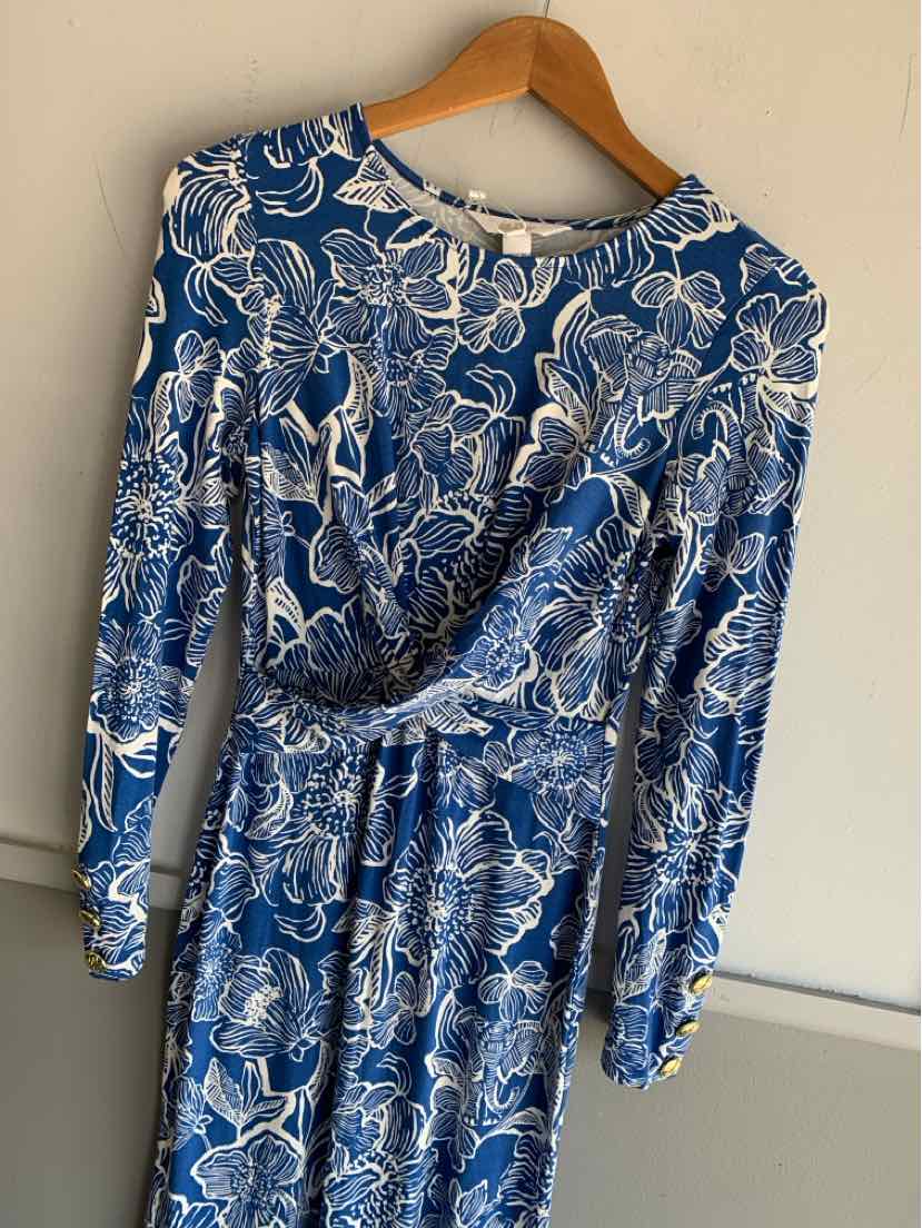 Blue long-sleeve dress with white tropical floral print and gathered waist in size XS.