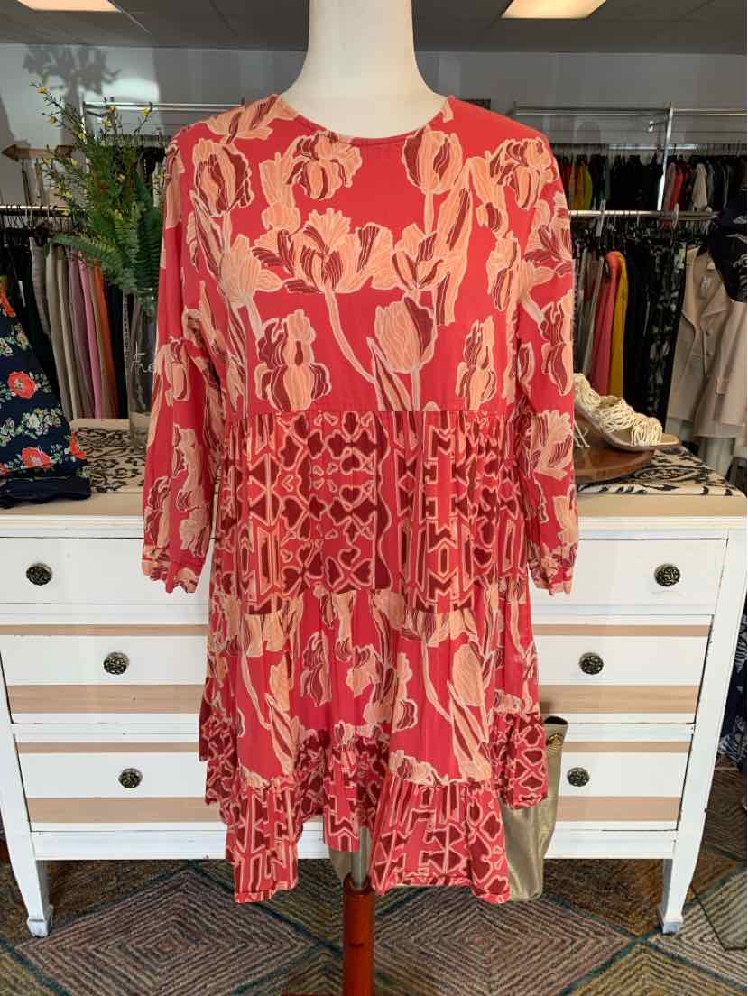 Red and pink floral pattern dress with long sleeves and a cinched waist detail in medium size.