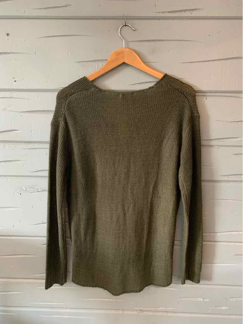 Olive green long-sleeve knit sweater with a crew neckline, medium size, hanging on wooden hanger.