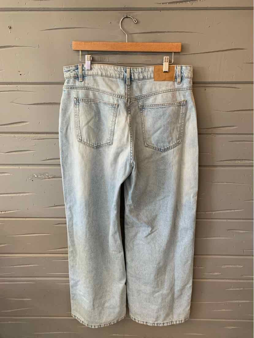 Light blue denim jeans with a relaxed fit, back pockets, and a high waist, size 14.