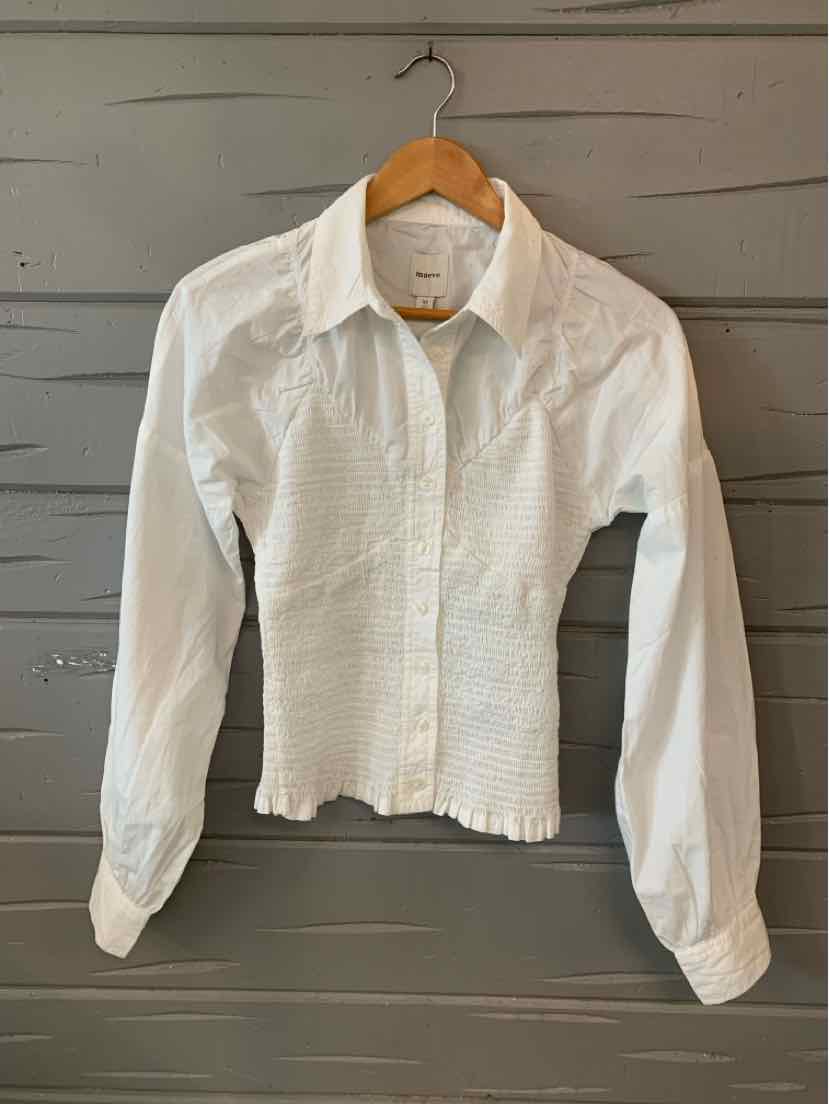White long-sleeve blouse with button front and subtle textured fabric in size XS.