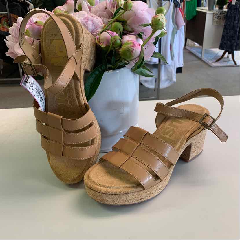 Tan leather open-toe sandals with adjustable ankle strap and low block heel.