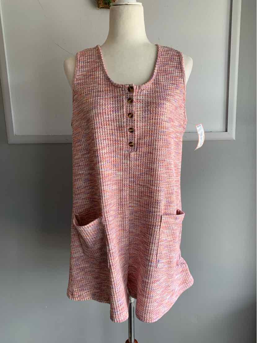 Sleeveless knit tunic in pink and white with front buttons and two front patch pockets.