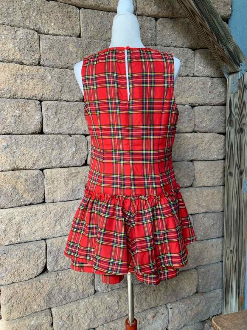 Red plaid sleeveless dress with a fitted bodice, round neckline, and gathered flared skirt.