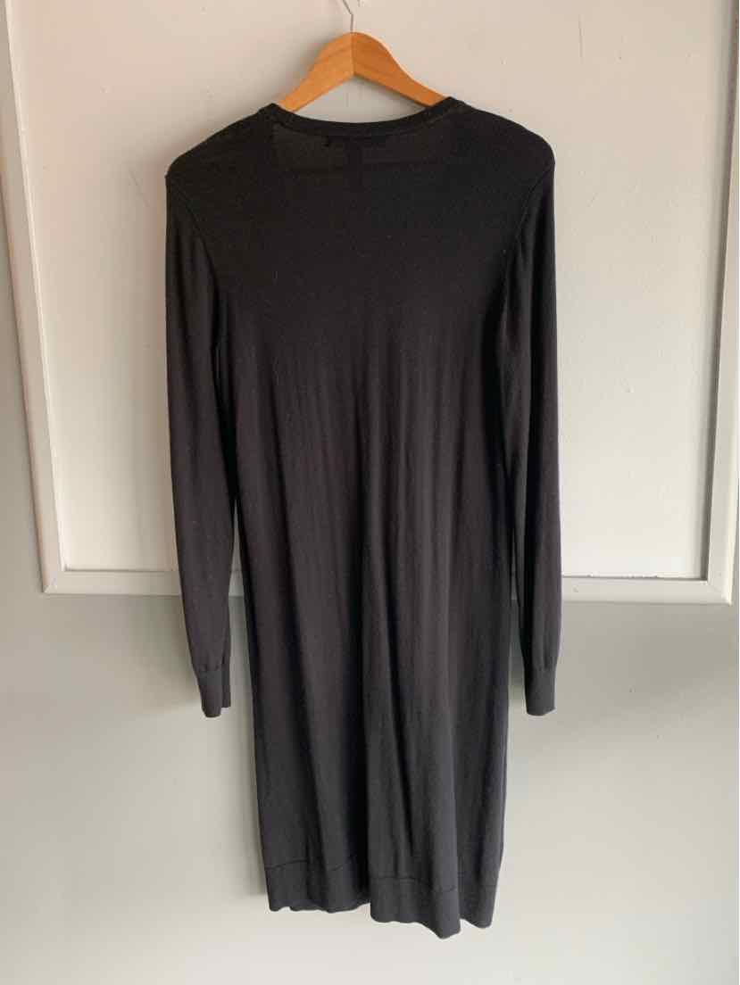 Black long-sleeve midi dress with a round neckline and a straight silhouette.