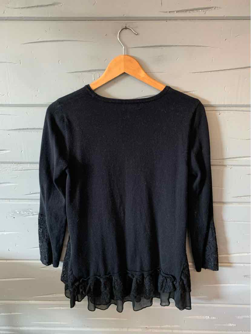 Black long-sleeve blouse with round neckline and ruffled hem, lightweight fabric, size small.