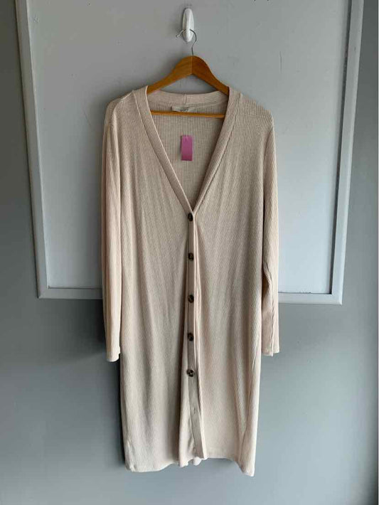 Long beige knitted cardigan with buttons down the front, V-neckline, and long sleeves, size XL.