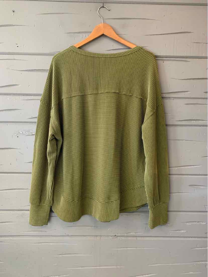 Olive green long-sleeve knit top with a wide neckline and relaxed fit, shown from the back.