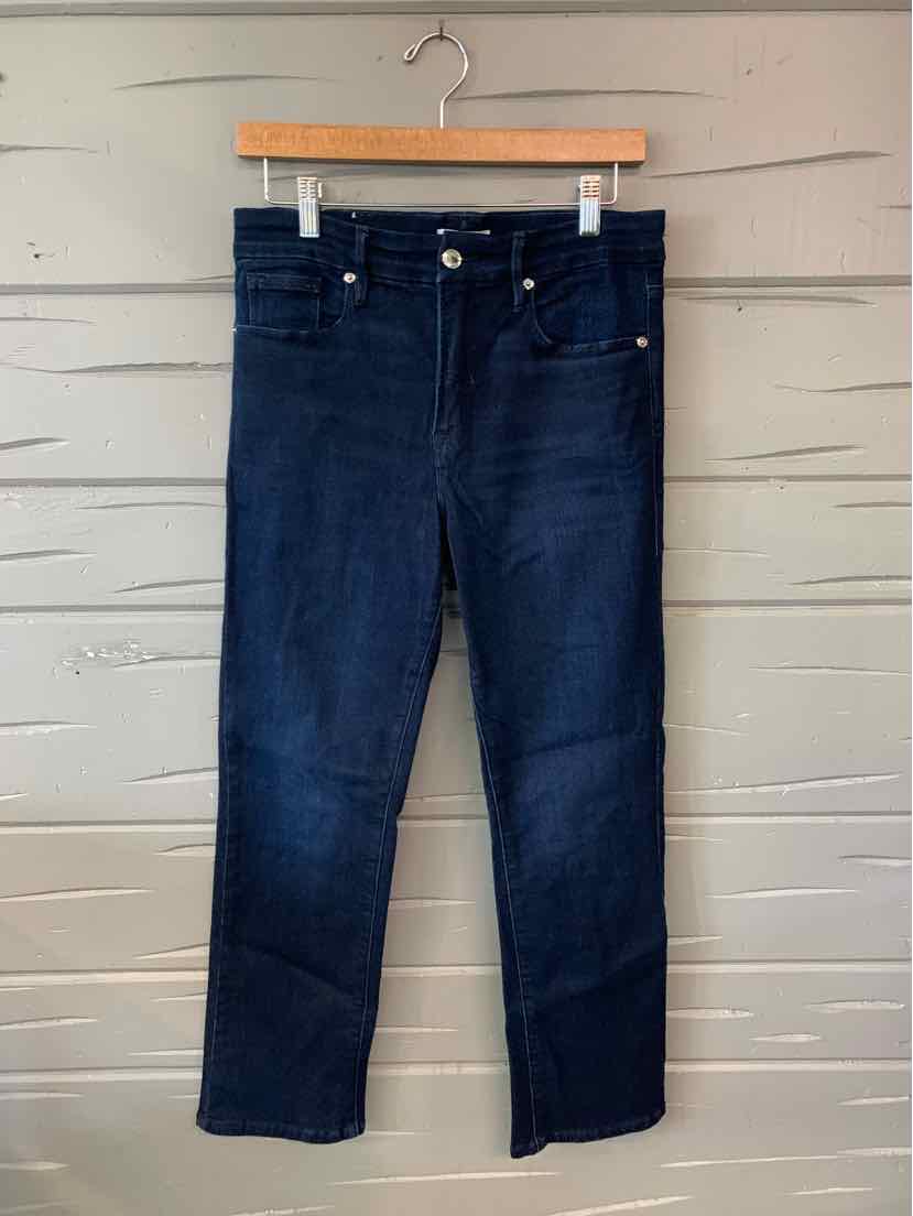 Dark indigo straight-leg denim jeans with classic five-pocket styling and metal button closure.