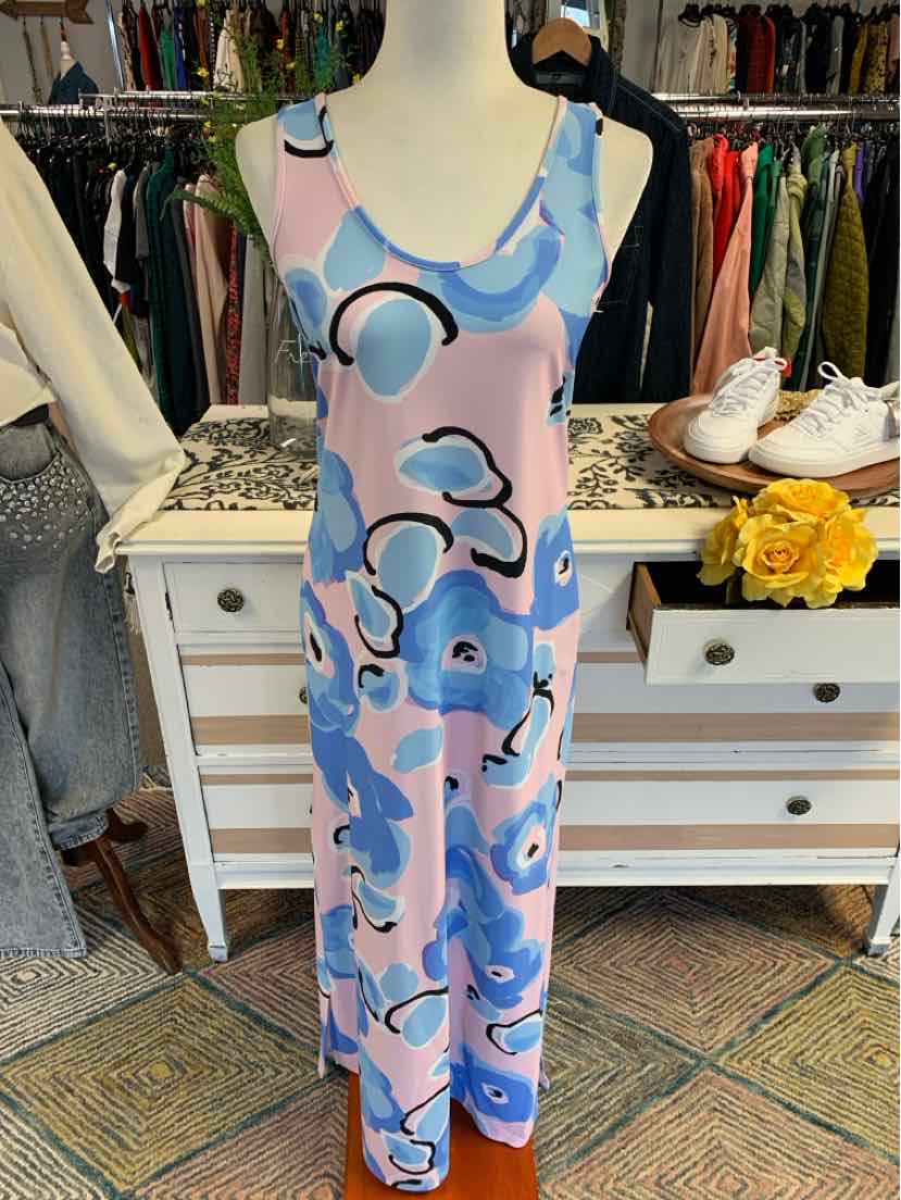 Sleeveless midi dress with abstract blue, pink, and black floral pattern on soft fabric.