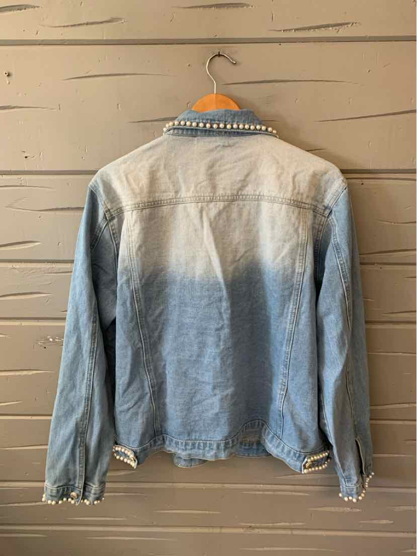 Light blue denim jacket with faded gradient effect, studded collar, and buttoned cuffs.