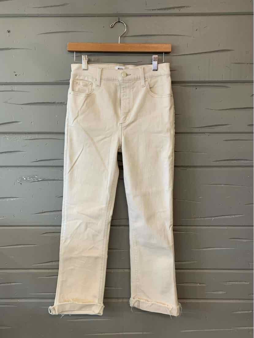 Cream-colored straight-leg denim jeans with back pockets and a button closure, size 2.