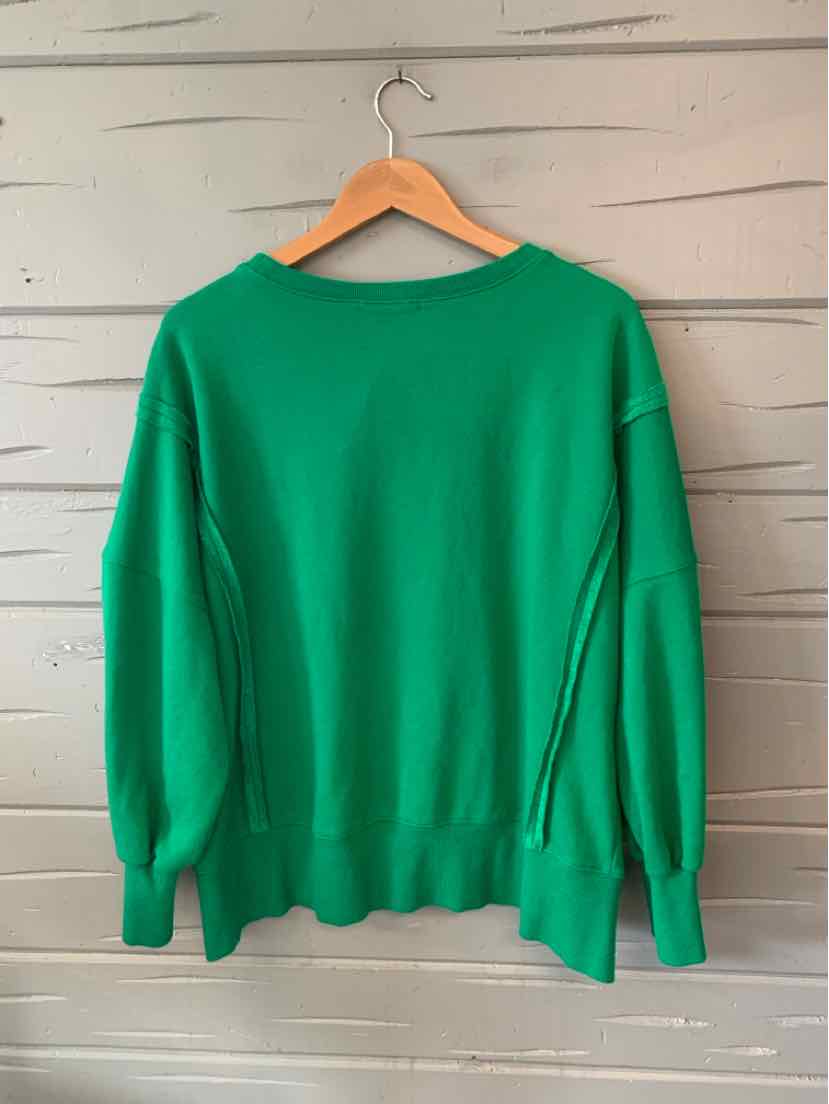 Green long-sleeve sweater with ribbed cuffs and hem, featuring a relaxed fit and crew neckline.