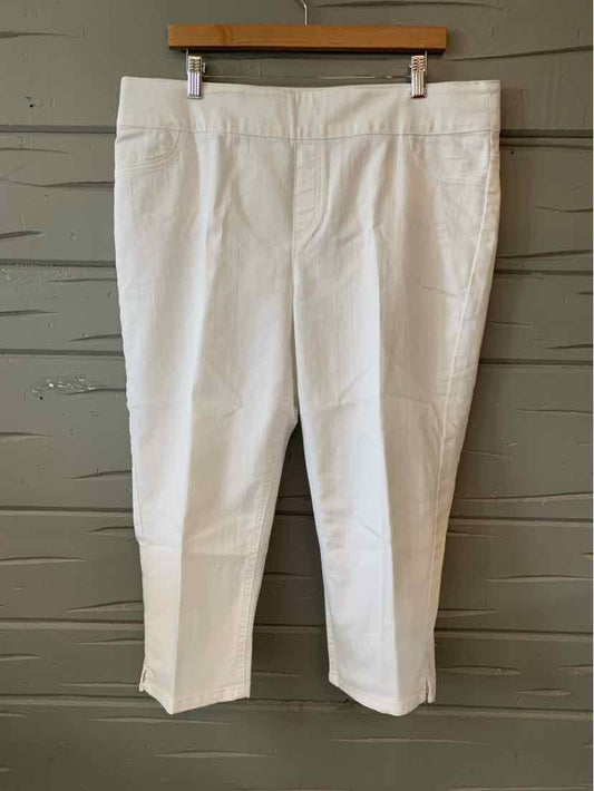 White mid-rise chinos with straight legs, flat front, and side pockets, size 16/18.