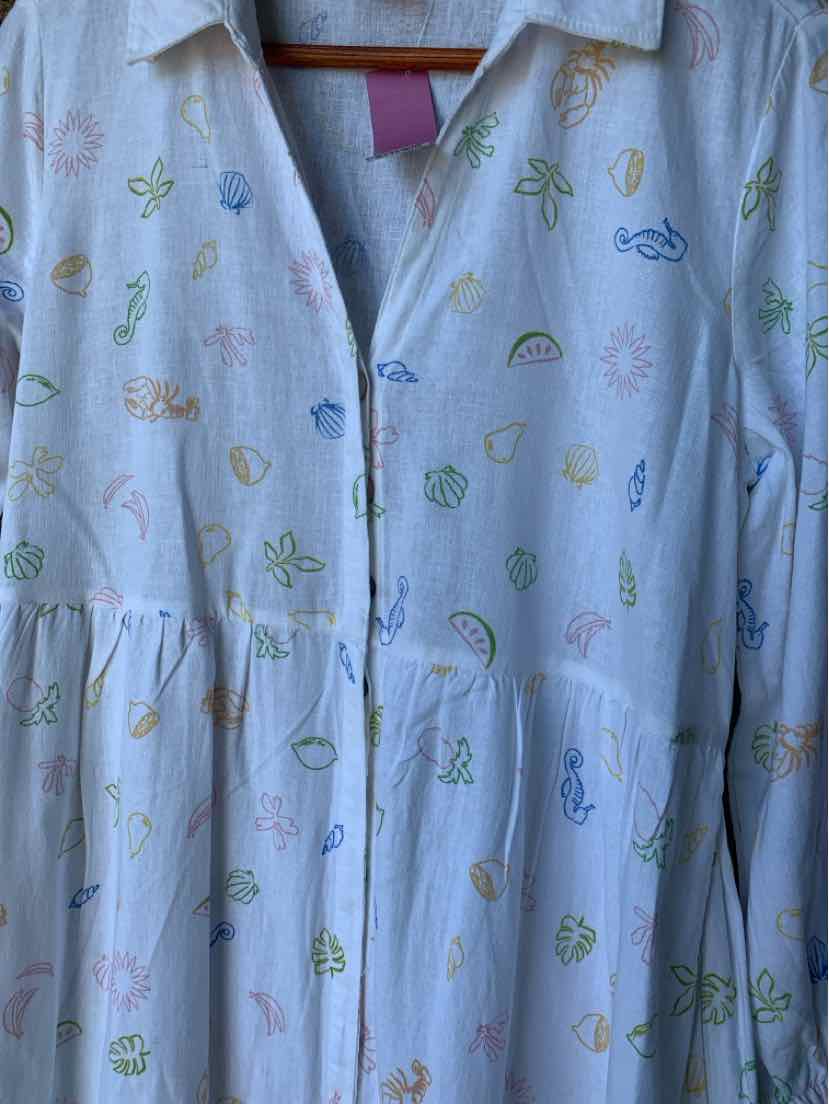 Light blue long-sleeve dress with button front and colorful whimsical prints of rainbows, stars, and animals.