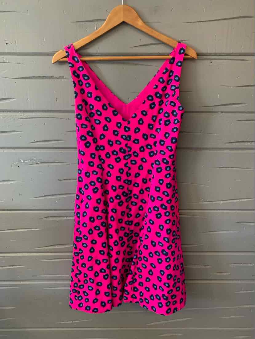 Pink sleeveless dress with black cheetah spots and a V-neckline, size 4.